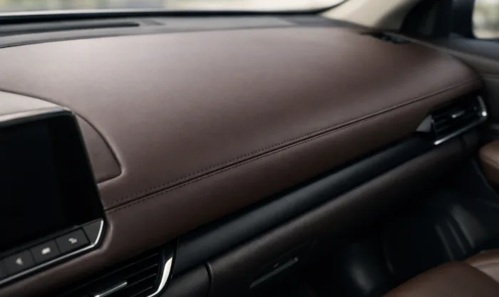 After Leather Dashboard Repainting After UV Fading on Dark Brown Leather Dashboard in Los Angeles