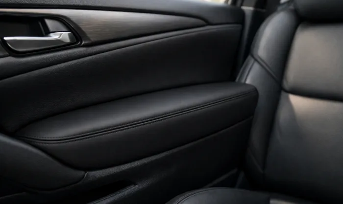After Door Armrest Repainting After Wear on Black Vinyl Armrest Insert in Los Angeles