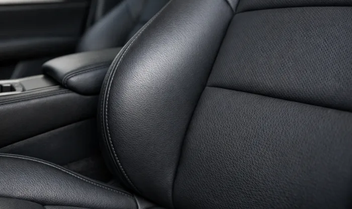 After Torn Leather Seam Repair on Car Seat Bolster in Los Angeles