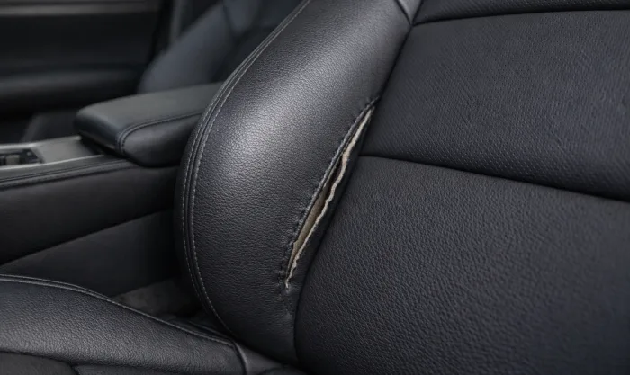 Before Torn Leather Seam Repair on Car Seat Bolster in Los Angeles