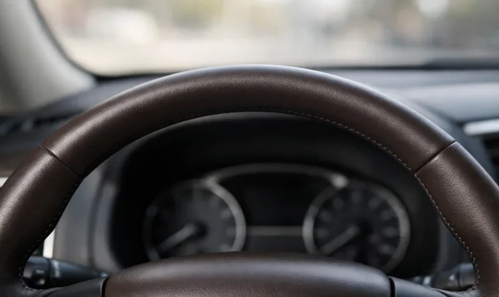 After Steering Wheel Scuff and Grease Stain Restoration on Dark Brown Leather Steering Wheel in Los Angeles